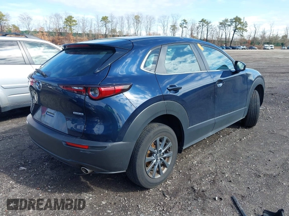 2023 Mazda CX-30 S with VIN 3MVDMBAM1PM583896, listed as a IAAI auction lot 41732091 with 26,298 mi miles and . Bid and sale history available at carsss.com. Image 4.