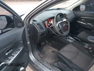 2018 Mitsubishi Outlander ES z VIN JA4AP3AU1JZ034958, wystawiony jako IAAI lot #41298536 z przebiegiem 145 267 mil mil oraz . Historia ofert i sprzedaży dostępna na DreamBid. Obrazek 22.