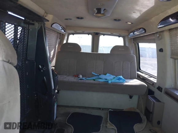 2002 Chevrolet Express z VIN 1GBFG15R421225008, wystawiony jako IAAI lot #41989417 z przebiegiem 156 936 mil mil oraz . Historia ofert i sprzedaży dostępna na DreamBid. Obrazek 8.