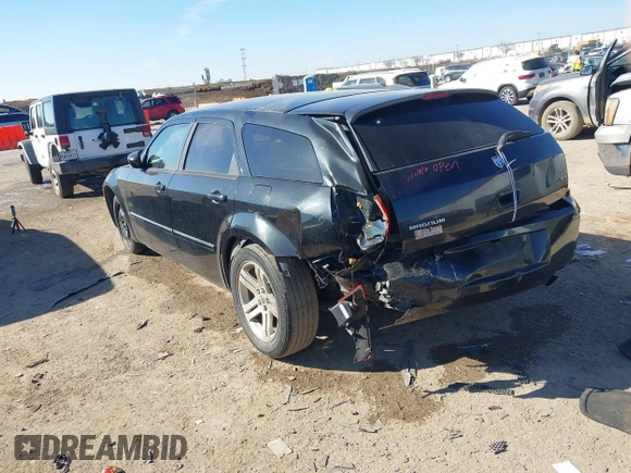 2005 Dodge Magnum SE with VIN 2D4FV48V55H661046, listed as a IAAI auction lot 41644364 with 125,400 mi miles and . Bid and sale history available at carsss.com. Image 3.