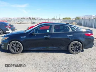 2016 Kia Optima LX with VIN 5XXGT4L32GG108695, listed as a IAAI auction lot 41647970 with 125,319 mi miles. Bid and sale history available at carsss.com. Image 14.
