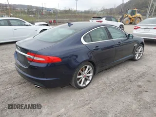 2015 Jaguar XF V6 Portfolio with VIN SAJWJ0FF5F8U67140, listed as a IAAI auction lot 41967522 with 68,000 mi miles. Bid and sale history available at carsss.com. Image 4.