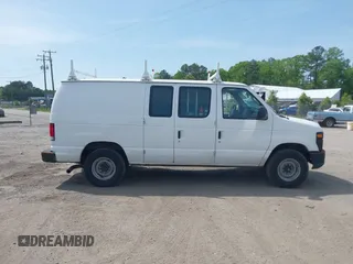 2014 Ford Econoline Cargo Commercial with VIN 1FTNE2EL6EDA22641, listed as a IAAI auction lot 42156425 with 233,745 mi miles. Bid and sale history available at carsss.com. Image 13.