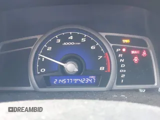 2009 Honda Civic EX with VIN 2HGFG12899H518424, listed as a IAAI auction lot 42019765 with 214,577 mi miles and . Bid and sale history available at DreamBid. Image 7.