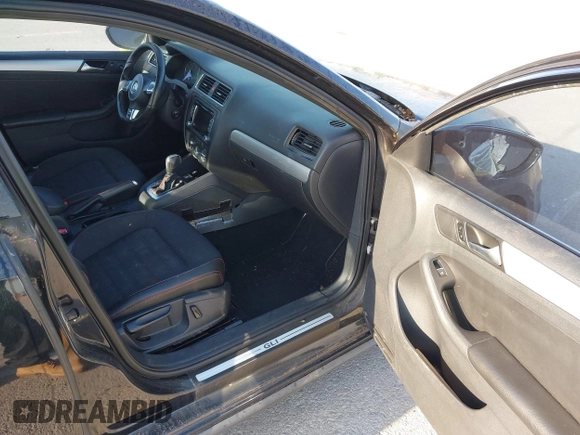 2013 Volkswagen Jetta GLI with VIN 3VW4S7AJ2DM300120, listed as a IAAI auction lot 42002950 with 106,304 mi miles and . Bid and sale history available at DreamBid. Image 5.