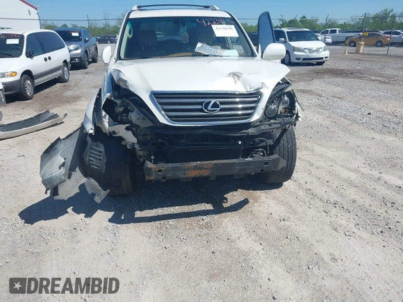 2004 Lexus GX 470 with VIN JTJBT20XX40038671, listed as a IAAI auction lot 42238146 with 250,837 mi miles and . Bid and sale history available at DreamBid. Image 6.