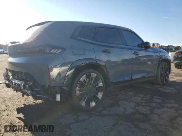 2024 BMW XM z VIN 5YM23CS00R9V38387, wystawiony jako Copart lot #86828434 z przebiegiem Nie podano mil oraz Szkody całkowita. Historia ofert i sprzedaży dostępna na DreamBid. Obrazek 3.