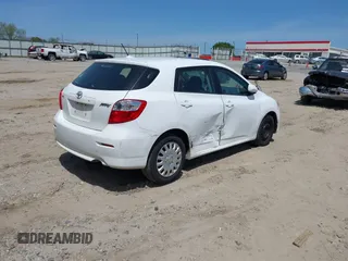 2009 Toyota Matrix with VIN 2T1KU40E39C091087, listed as a IAAI auction lot 42033558 with 338,496 mi miles. Bid and sale history available at carsss.com. Image 4.