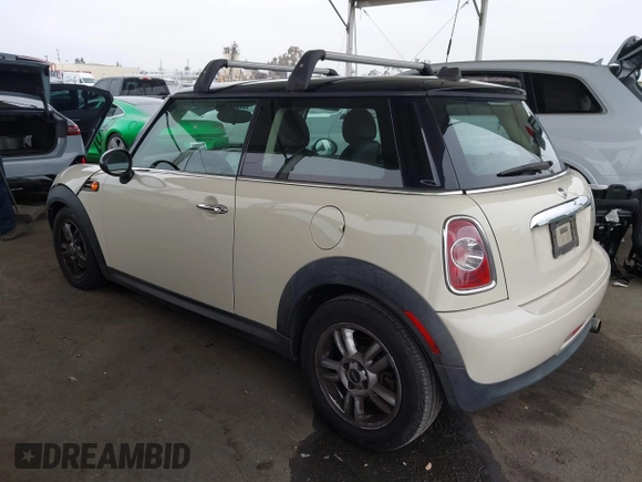 2013 MINI Hardtop with VIN WMWSU3C53DT684999, listed as a IAAI auction lot 42163800 with 89,774 mi miles and . Bid and sale history available at DreamBid. Image 3.