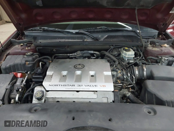 2002 Cadillac DeVille with VIN 1G6KD54Y12U214732, listed as a IAAI auction lot 42018412 with 139,474 mi miles. Bid and sale history available at carsss.com. Image 10.