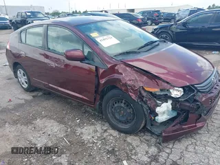 2011 Honda Insight with VIN JHMZE2H30BS005188, listed as a IAAI auction lot 42492324 with 104,396 mi miles and . Bid and sale history available at DreamBid. Image 1.