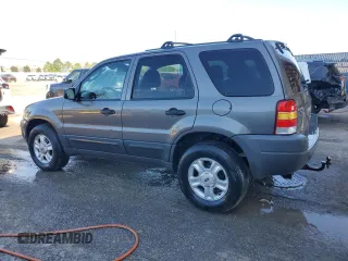 2004 Ford Escape XLT with VIN 1FMYU03154KA96127, listed as a Copart auction lot 71851434 with 168,773 mi miles and Salvage Title. Bid and sale history available at carsss.com. Image 2.