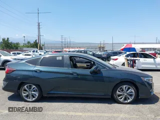 2018 Honda Clarity z VIN JHMZC5F19JC012951, wystawiony jako IAAI lot #42404688 z przebiegiem 213 122 mil mil oraz . Historia ofert i sprzedaży dostępna na DreamBid. Obrazek 13.