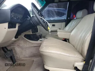 1988 BMW 5 Series 535i with VIN WBADC8407J3261205, listed as a Copart auction lot 87406714 with 45,211 mi miles and Salvage Title. Bid and sale history available at carsss.com. Image 7.