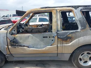 2002 Ford Explorer Sport Value with VIN 1FMYU60E02UB37971, listed as a IAAI auction lot 41936153 with Not provided miles and . Bid and sale history available at DreamBid. Image 13.