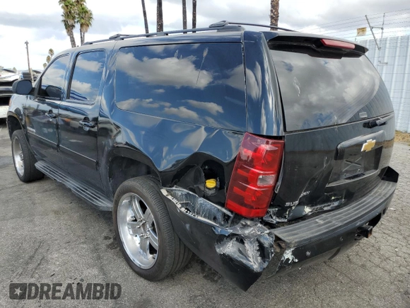 2013 Chevrolet Suburban LT with VIN 1GNSKJE76DR318499, listed as a Copart auction lot 71840624 with 191,050 mi miles and Salvage Title. Bid and sale history available at carsss.com. Image 2.