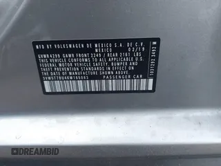2019 Volkswagen Jetta GLI S z VIN 3VW5T7BU4KM165083, wystawiony jako IAAI lot #40729763 z przebiegiem 75 414 mil mil oraz . Historia ofert i sprzedaży dostępna na DreamBid. Obrazek 9.