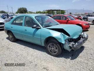 1999 Ford Escort LX with VIN 1FAFP10P6XW196483, listed as a Copart auction lot 59215635 with 74,859 mi miles and Salvage title. Bid and sale history available at DreamBid. Image 4.