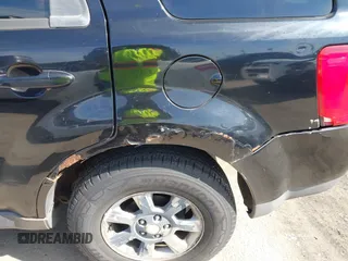 2008 Mazda Tribute Sport with VIN 4F2CZ02Z68KM15550, listed as a IAAI auction lot 41615133 with 215,803 mi miles and . Bid and sale history available at DreamBid. Image 6.