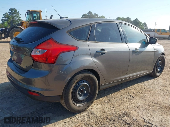 2012 Ford Focus SE with VIN 1FAHP3K28CL308346, listed as a IAAI auction lot 42034073 with 182,387 mi miles and . Bid and sale history available at carsss.com. Image 4.