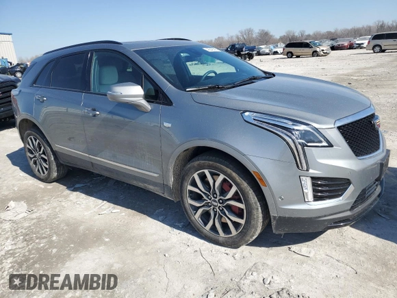 2023 Cadillac XT5 AWD Sport with VIN 1GYKNGRS7PZ133622, listed as a Copart auction lot 48342095 with 63,008 mi miles and Salvage title. Bid and sale history available at DreamBid. Image 4.