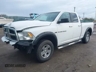 2012 Ram 1500 Big Horn z VIN 1C6RD6GT0CS323124, wystawiony jako IAAI lot #41486027 z przebiegiem 107 784 mil mil oraz . Historia ofert i sprzedaży dostępna na DreamBid. Obrazek 2.
