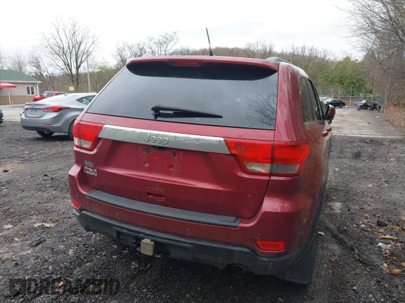 2012 Jeep Grand Cherokee Laredo with VIN 1C4RJFAG7CC123669, listed as a IAAI auction lot 42001472 with 164,806 mi miles. Bid and sale history available at carsss.com. Image 20.
