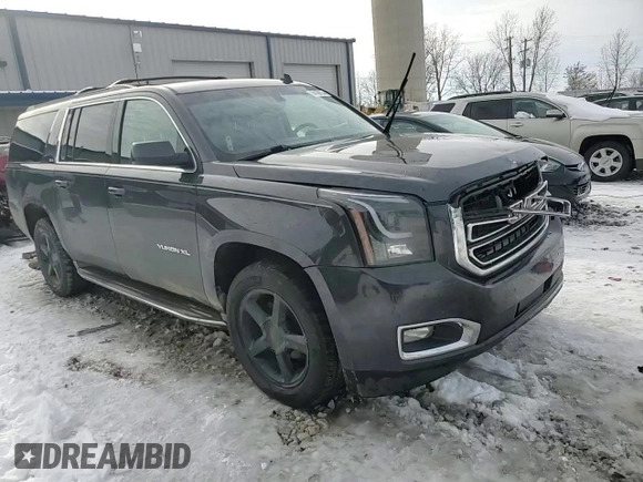 2015 GMC Yukon XL z VIN 1GKS2GECXFR210029, wystawiony jako Copart lot #84109134 z przebiegiem 176 419 mil mil oraz Tytuł czysty. Historia ofert i sprzedaży dostępna na DreamBid. Obrazek 14.