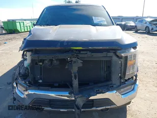 2021 Ford F-150 XL with VIN 1FTFW1E58MFA84347, listed as a IAAI auction lot 41402387 with 133,150 mi miles. Bid and sale history available at carsss.com. Image 6.