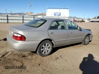 2002 Mazda 626 LX with VIN 1YVGF22C125279863, listed as a Copart auction lot 87103664 with 139,633 mi miles and Salvage Title. Bid and sale history available at carsss.com. Image 3.