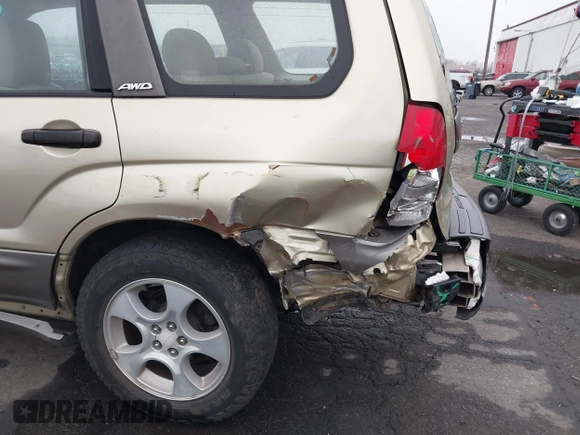 2003 Subaru Forester XS with VIN JF1SG65663H753306, listed as a IAAI auction lot 41311689 with 253,269 mi miles. Bid and sale history available at carsss.com. Image 6.