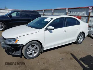 2012 Volkswagen Jetta TDI w/Premium & Nav with VIN 3VWLL7AJXCM426846, listed as a IAAI auction lot 42492125 with 127,342 mi miles and . Bid and sale history available at DreamBid. Image 2.