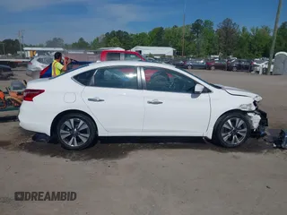 2019 Nissan Sentra S with VIN 3N1AB7AP8KY370532, listed as a IAAI auction lot 42097792 with 65,604 mi miles and . Bid and sale history available at DreamBid. Image 14.