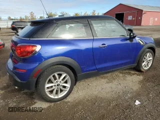 2013 MINI Paceman z VIN WMWSS1C58DWN93901, wystawiony jako Copart lot #77044034 z przebiegiem 189 375 mil mil oraz Czysty tytuł • Clean title. Historia ofert i sprzedaży dostępna na DreamBid. Obrazek 3.