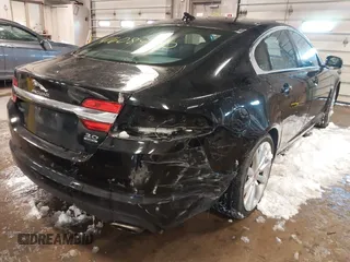 2014 Jaguar XF V6 SC with VIN SAJWJ0EF2E8U13746, listed as a IAAI auction lot 41608420 with 141,476 mi miles. Bid and sale history available at carsss.com. Image 6.