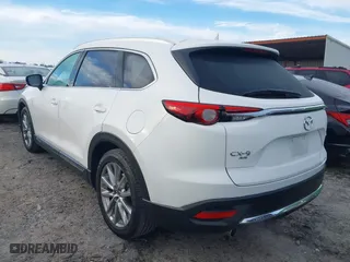 2016 Mazda CX-9 Grand Touring with VIN JM3TCBDY3G0116309, listed as a IAAI auction lot 40890199 with 64,948 mi miles. Bid and sale history available at carsss.com. Image 3.