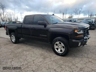 2018 Chevrolet Silverado 1500 LT with VIN 1GCVKREH7JZ217819, listed as a Copart auction lot 77070104 with 130,709 mi miles and Salvage Title. Bid and sale history available at carsss.com. Image 4.