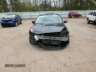 2016 Ford Focus SE z VIN 1FADP3F20GL305441, wystawiony jako Copart lot #55445105 z przebiegiem 117 033 mil mil oraz Szkoda całkowita • Salvage title. Historia ofert i sprzedaży dostępna na DreamBid. Obrazek 14.