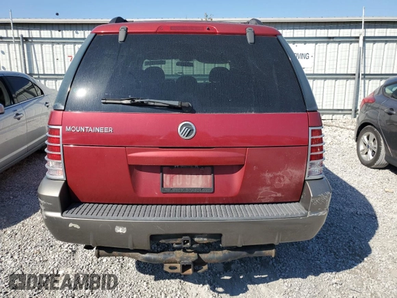 2004 Mercury Mountaineer Convenience with VIN 4M2ZU66K64UJ09787, listed as a Copart auction lot 74510694 with 209,802 mi miles and Salvage title. Bid and sale history available at DreamBid. Image 6.