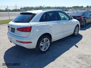 2017 Audi Q3 Premium with VIN WA1BCCFSXHR016914, listed as a IAAI auction lot 41784539 with 94,862 mi miles. Bid and sale history available at carsss.com. Image 4.