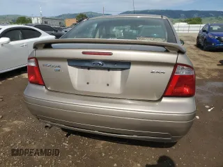 2005 Ford Focus S with VIN 1FAFP34NX5W263944, listed as a Copart auction lot 52973945 with 201,348 mi miles and Salvage Title. Bid and sale history available at carsss.com. Image 6.