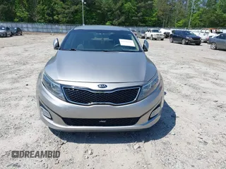2014 Kia Optima LX with VIN KNAGM4A79E5470198, listed as a IAAI auction lot 42142484 with 169,140 mi miles. Bid and sale history available at carsss.com. Image 6.
