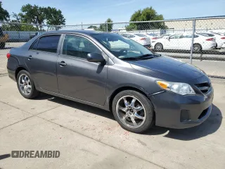 2013 Toyota Corolla L with VIN 2T1BU4EE4DC014150, listed as a Copart auction lot 56975465 with 184,354 mi miles and Clean Title. Bid and sale history available at DreamBid. Image 4.