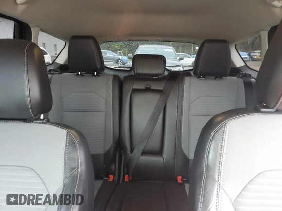 2018 Ford Escape SE z VIN 1FMCU9GD4JUA49819, wystawiony jako Copart lot #73023734 z przebiegiem 96 228 mil mil oraz Szkody całkowita. Historia ofert i sprzedaży dostępna na DreamBid. Obrazek 10.