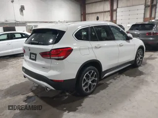 2021 BMW X1 xDrive28i with VIN WBXJG9C04M5T82884, listed as a IAAI auction lot 42242890 with 24,647 mi miles and . Bid and sale history available at DreamBid. Image 4.