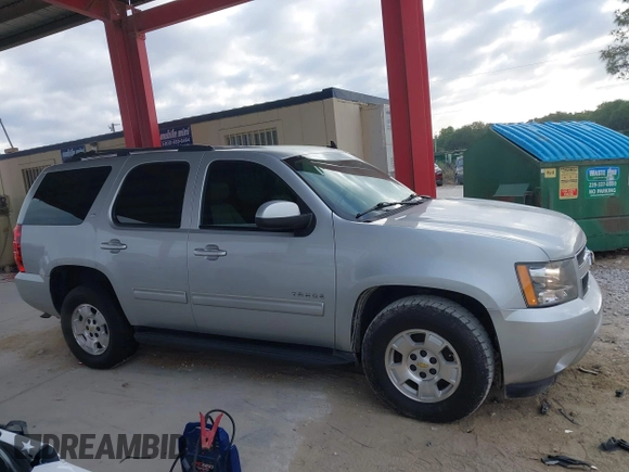 2012 Chevrolet Tahoe LT z VIN 1GNSCBE03CR144606, wystawiony jako IAAI lot #42005433 z przebiegiem 193 386 mil mil oraz . Historia ofert i sprzedaży dostępna na DreamBid. Obrazek 13.