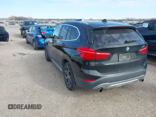 2016 BMW X1 xDrive28i with VIN WBXHT3Z3XG4A48557, listed as a IAAI auction lot 41387960 with 84,821 mi miles. Bid and sale history available at carsss.com. Image 3.