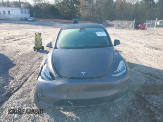 2022 Tesla Model Y Long Range with VIN 7SAYGAEE6NF361883, listed as a IAAI auction lot 41752441 with 50,493 mi miles and . Bid and sale history available at DreamBid. Image 12.