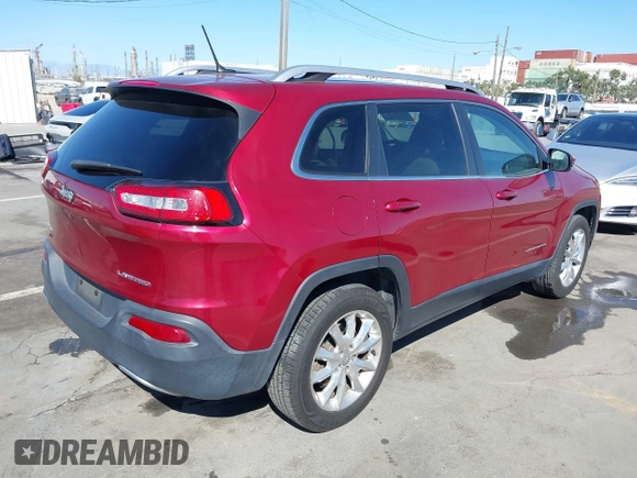 2015 Jeep Cherokee Limited with VIN 1C4PJMDB1FW599205, listed as a IAAI auction lot 41709308 with 112,415 mi miles. Bid and sale history available at carsss.com. Image 4.