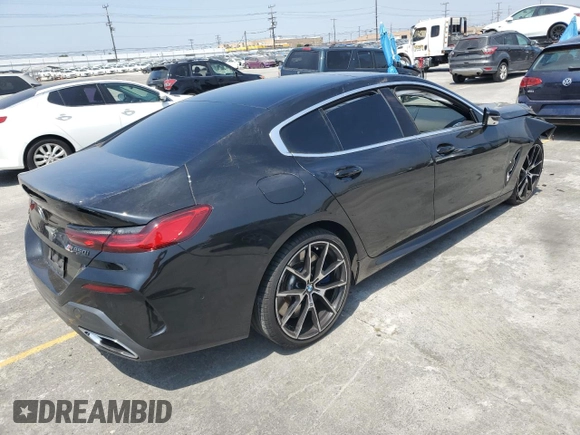 2020 BMW 8 Series M850i with VIN WBAGV8C01LCE50737, listed as a Copart auction lot 58318665 with Not provided miles and Salvage title. Bid and sale history available at DreamBid. Image 3.